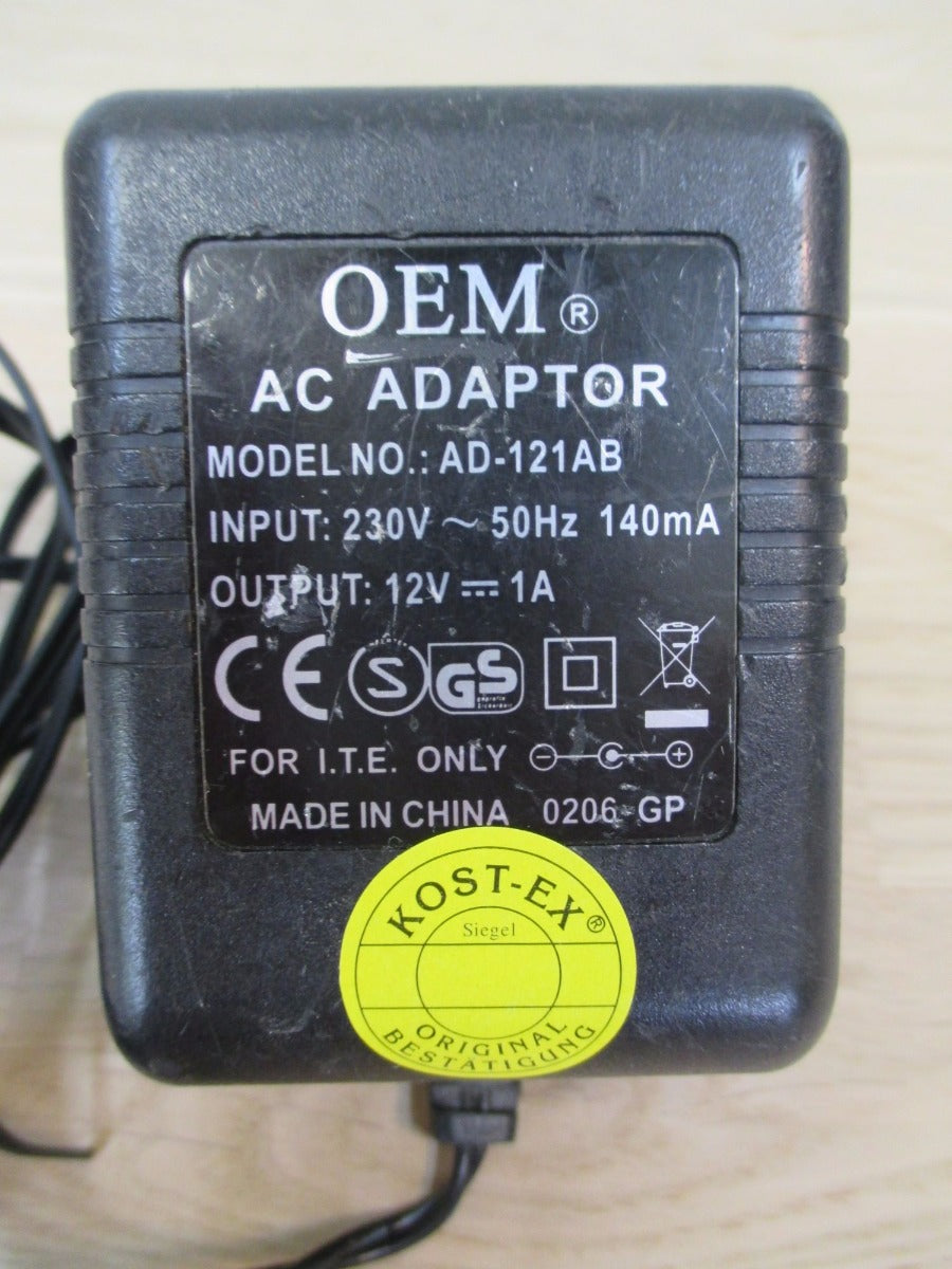Netzteil OEM AC Adapter AD - 121 AB input 220 V output 12 V 1 A Trafo T16/31