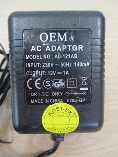 Netzteil OEM AC Adapter AD - 121 AB input 220 V output 12 V 1 A Trafo T16/31